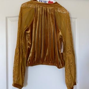 Brand new Free People velvet top with Tag on